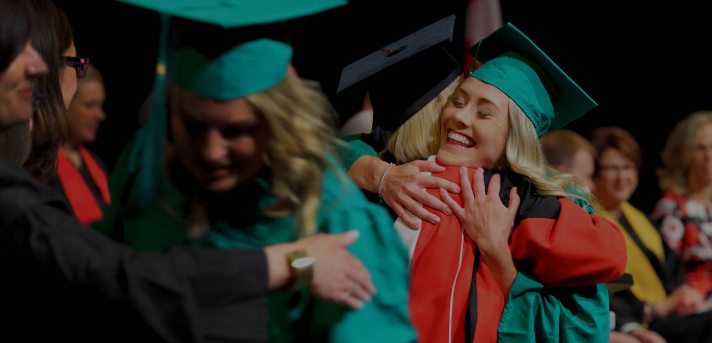 Student hugging Bow Valley College donor