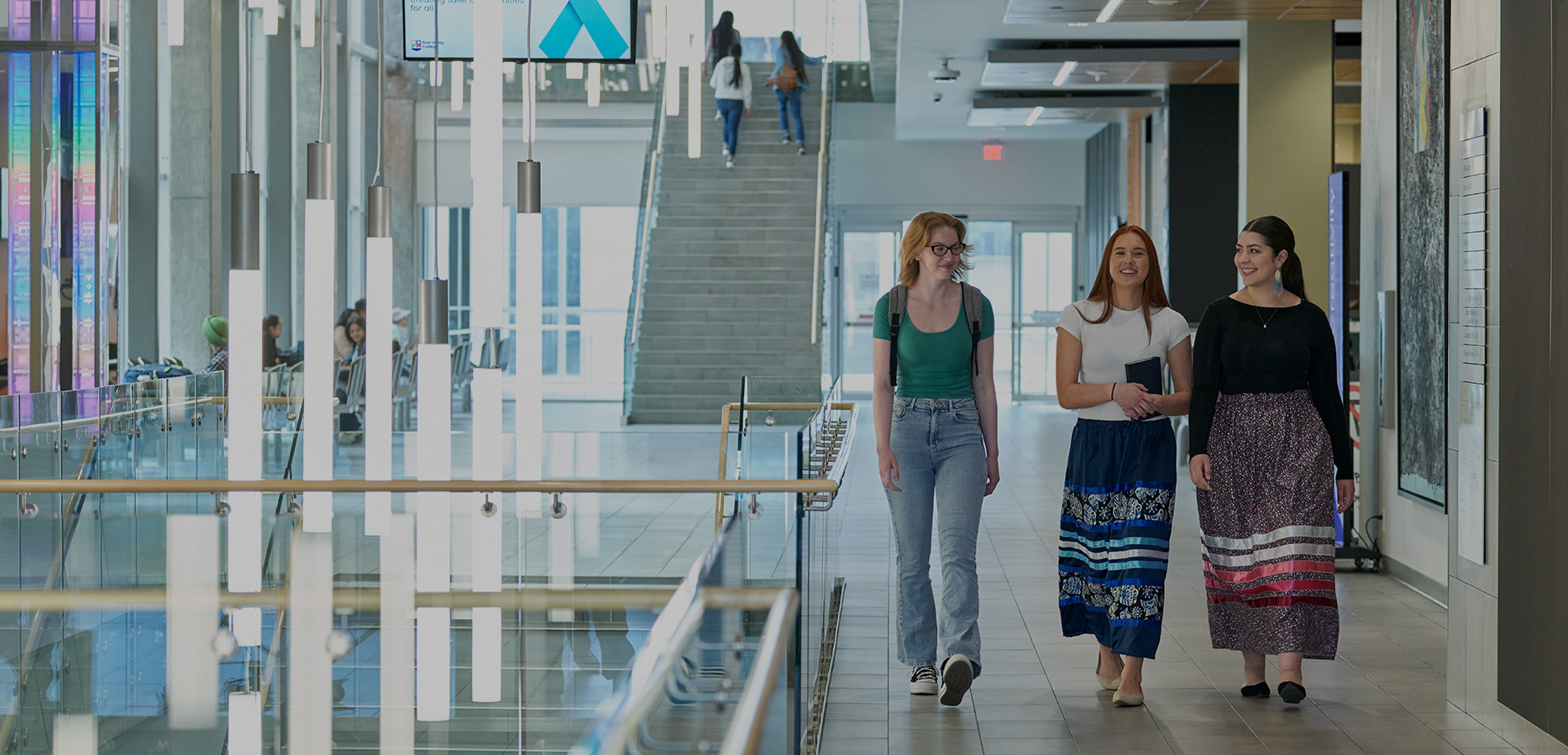 Students walking in the hallways of Bow Valley College South Campus
